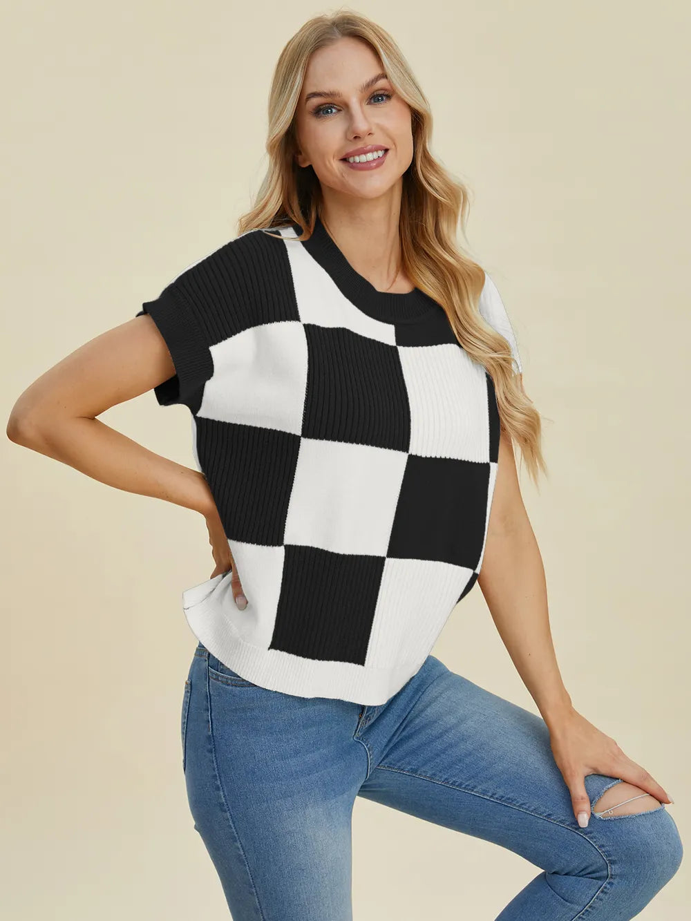 Turquoise checkered round neck short sleeve sweater by Trendsi, full size, casual knit with bold pattern and comfortable fit.