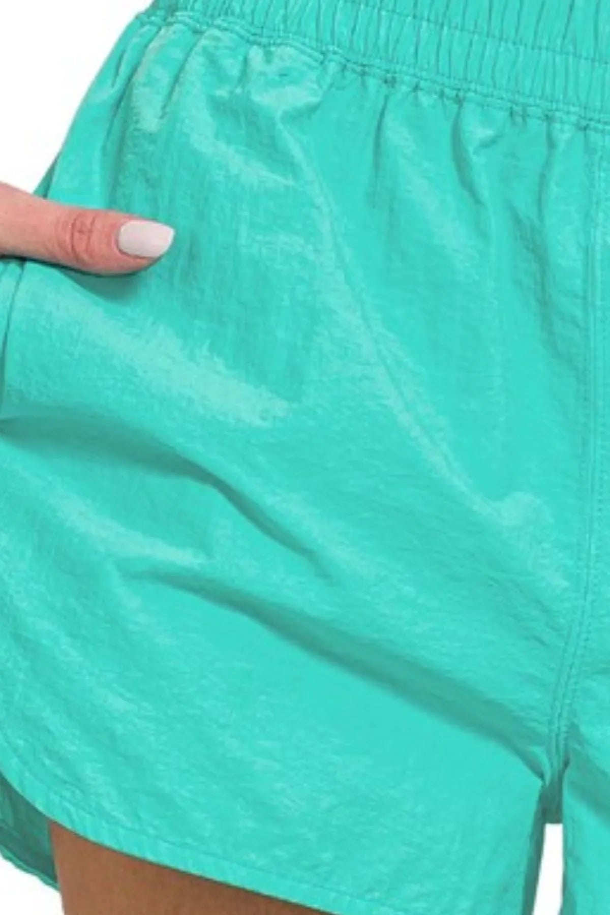 Turquoise Zenana windbreaker running shorts with smocked waistband and relaxed fit, ideal for active wear.