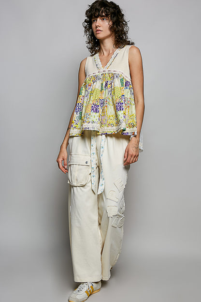 Cream-colored POL floral V-neck sheer tank top with lace trim, stylish and lightweight from Trendsi.