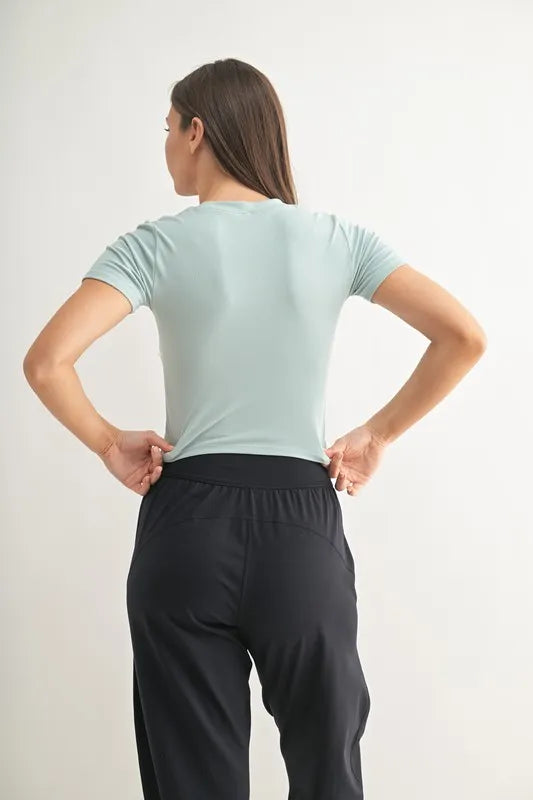 Vintage blue MONO B Essential micro-ribbed cropped athleisure tee by Trendsi, showcasing fitted micro-rib fabric and cropped style.