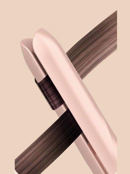 Watermelon pink ceramic hair straightener by Trendsi, with sleek design and ceramic plates for smooth styling.