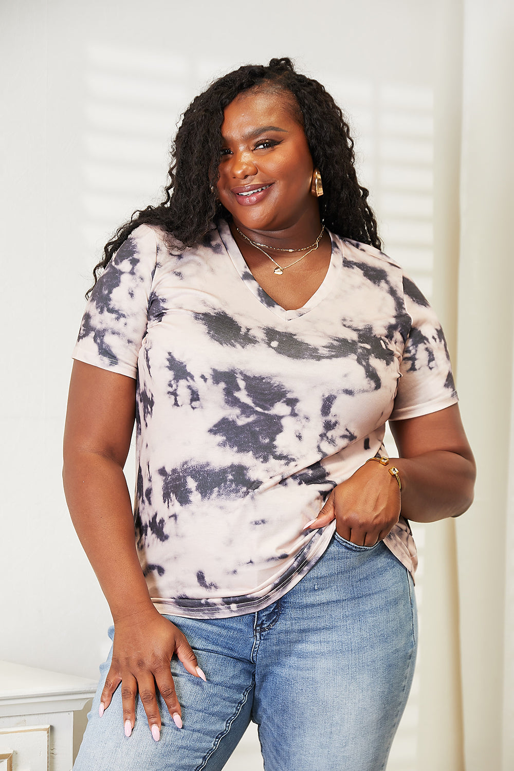 Watermelon pink Double Take Tie-Dye V-Neck T-Shirt by Trendsi showing vibrant tie-dye pattern and V-neck design.