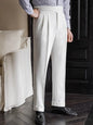 White men's pleated wide-leg dress pants from Trendsi, tailored fit with front pleats and a comfortable waistband.