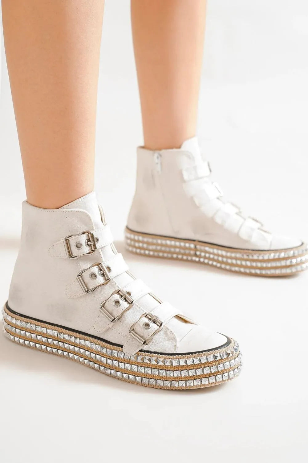 White Beast Fashion platform sneakers with multiple buckle straps and studded details, designed by Trendsi.