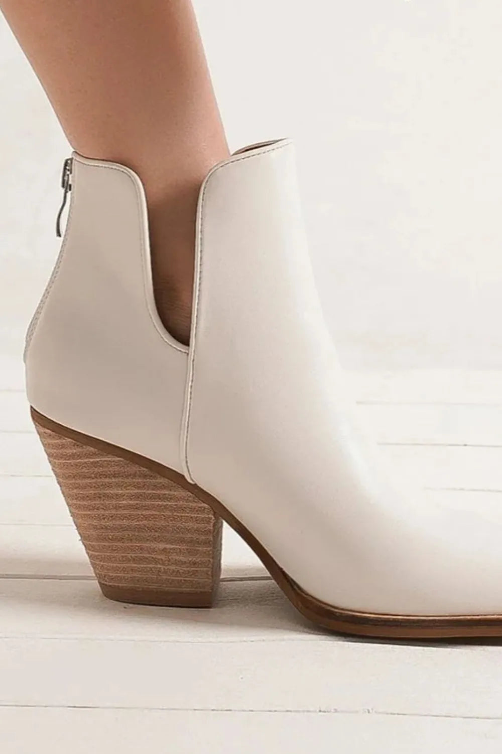 White Trendsi Beast Fashion pointed metal-tip toe block heel ankle boots, stylish footwear with a sleek design and ankle height.