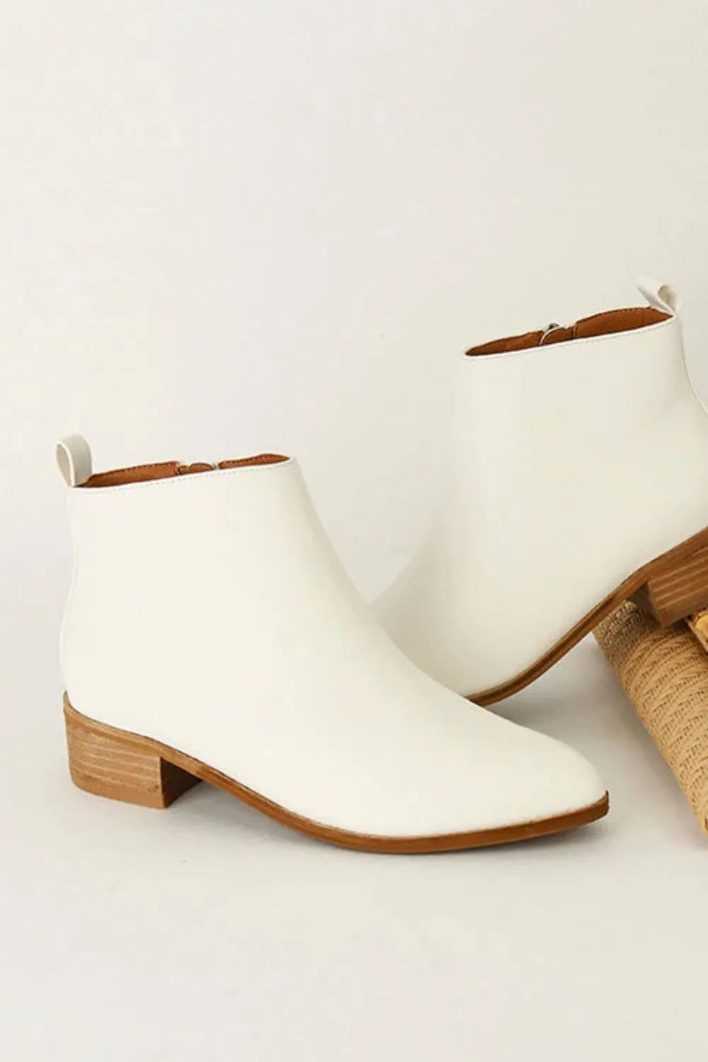 White Beast Fashion PU leather block heel boots with ankle height and stylish design, from Trendsi.