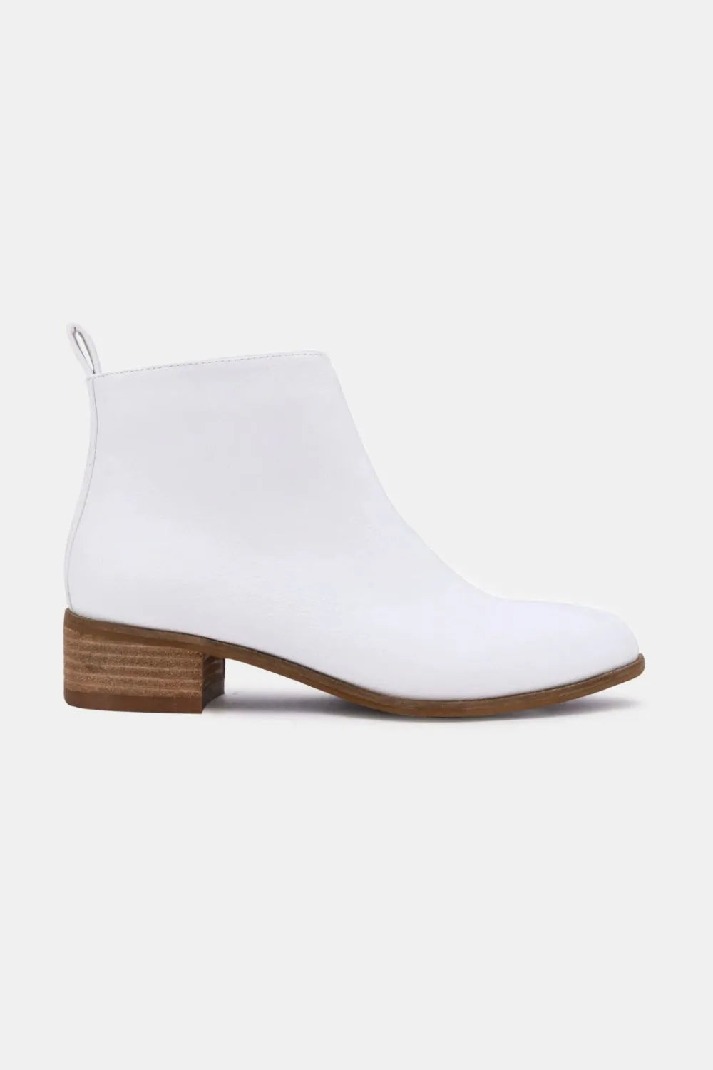 White PU leather block heel boots from Beast Fashion by Trendsi, featuring a stylish design and chunky heel for a fashionable look.