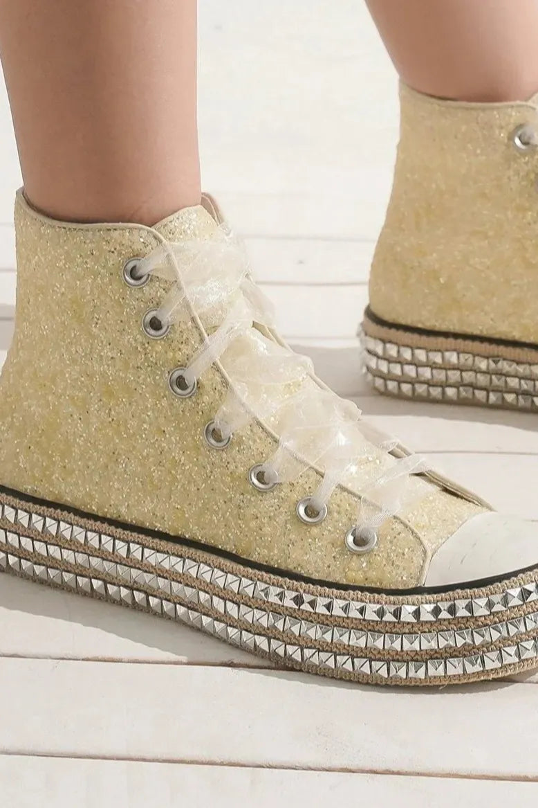 White Beast Fashion glitter lace-up studded platform sneakers featuring bold design and trendy style.