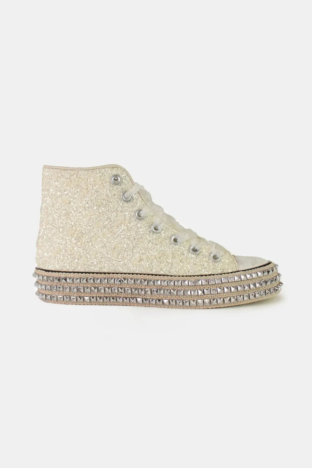 White glitter lace-up platform sneakers with studded details from Beast Fashion by Trendsi, showcasing a trendy and stylish design.