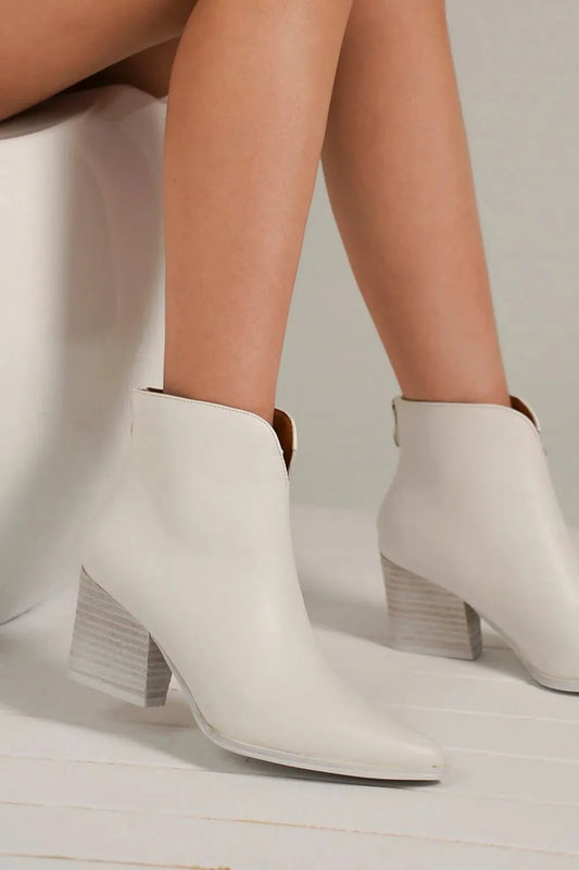 White Beast Fashion PU leather block heel boots with back zippers, featuring a stylish design and comfortable ankle fit.