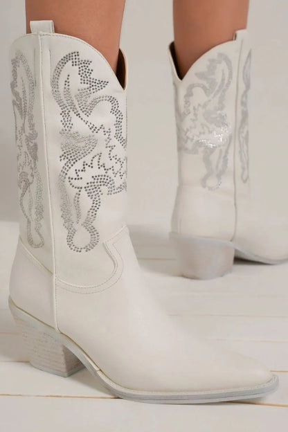 White Beast Fashion point toe boots with rhinestone details from Trendsi, featuring stylish design and sleek silhouette.