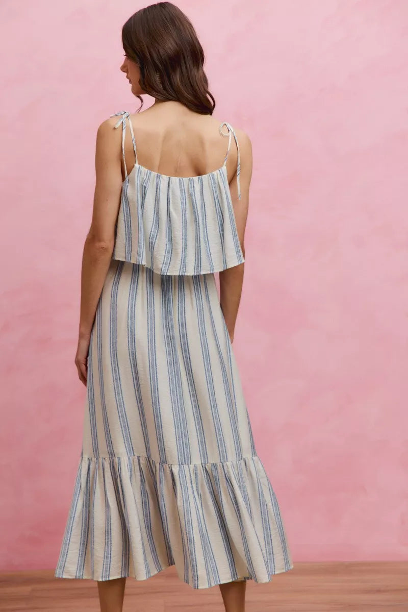 White and blue stripe SO ME tiered midi dress with shoulder tie detail, lined and stylish, by Trendsi.