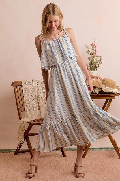 White and blue stripe tiered midi dress with shoulder tie details, lined and stylish, by SO ME for a trendy look.