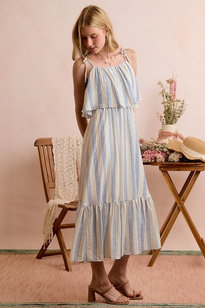White and blue stripe tiered midi dress with shoulder tie detail, lined and stylish, from SO ME by Trendsi.