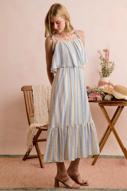 White and blue stripe tiered midi dress with shoulder tie detail, lined and stylish, from SO ME by Trendsi.