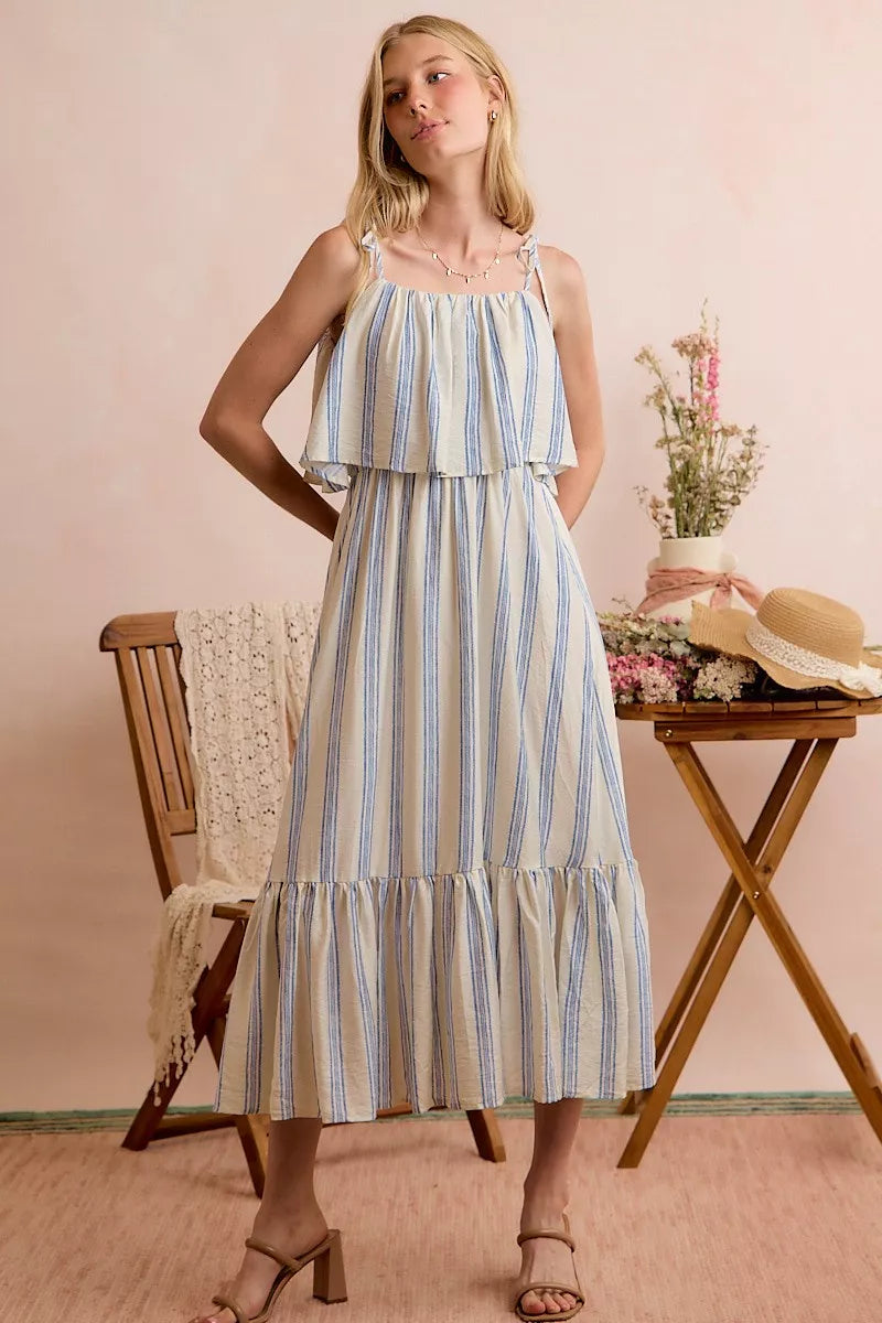 White and blue striped SO ME tiered midi dress with shoulder tie detail, lined, by Trendsi.