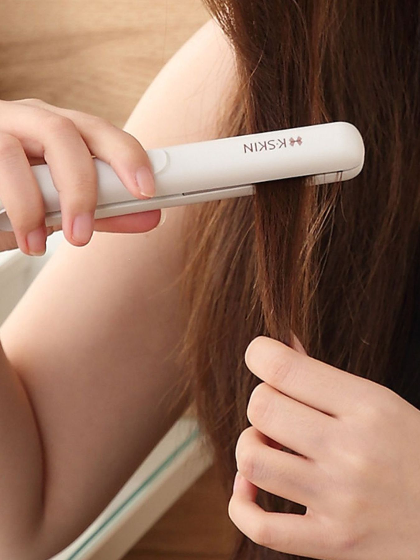 Trendsi portable mini hair straightener with white European plug, compact styling tool for quick hair smoothing.