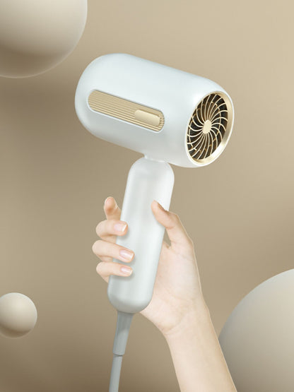 White portable negative ion hair dryer with European plug by Trendsi, compact design for travel and quick styling.