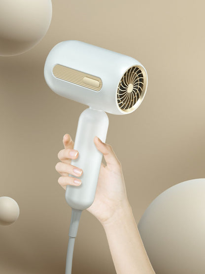 White portable negative ion high-speed hair dryer with European plug, compact design, and ergonomic handle by Trendsi.