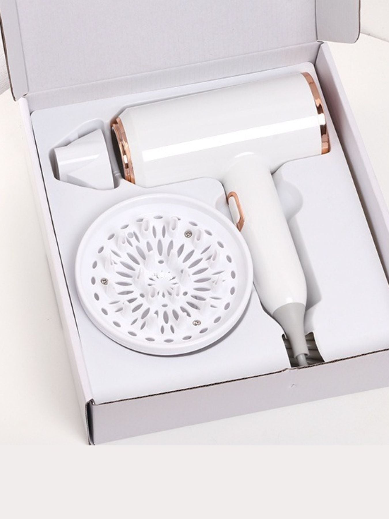 White Trendsi household hair dryer with European plug, quick-drying hair care device for efficient styling and hair drying.