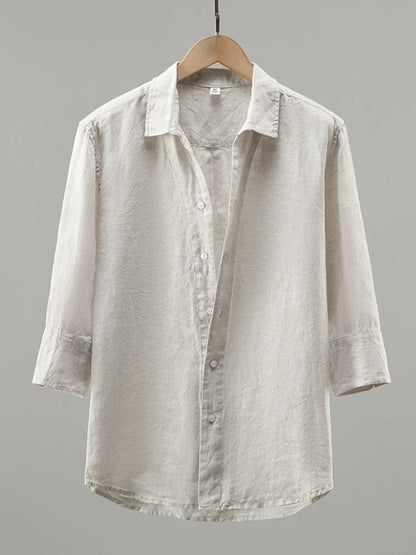 White men's plus size long sleeve button-up shirt by Trendsi, shown flat with collar and button details.