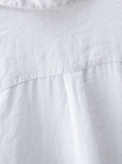 White men's plus size long sleeve button-up shirt from Trendsi, featuring a classic collar and button cuffs.