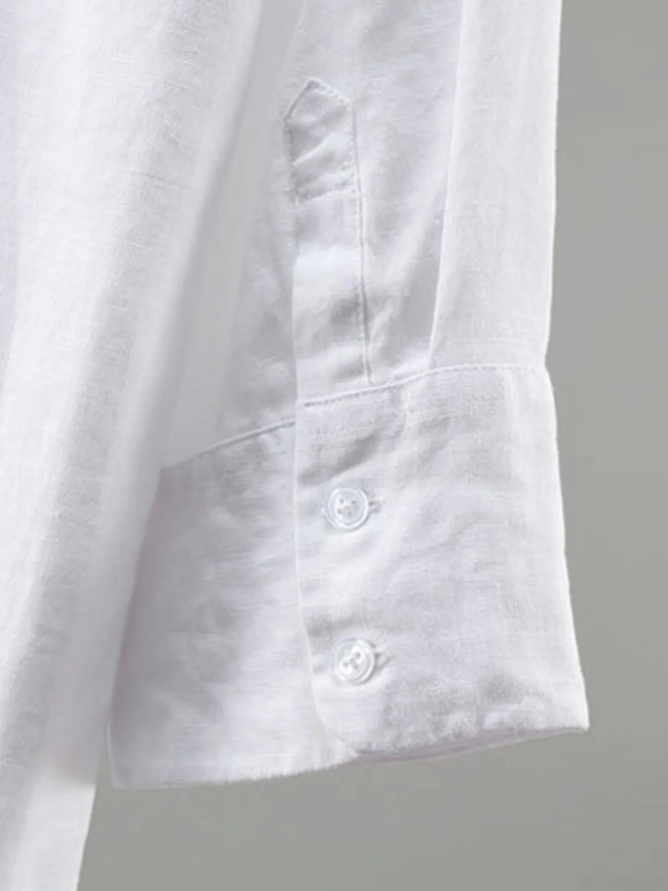 White men's plus size long sleeve button-up shirt by Trendsi, featuring a classic collar and front button closure.