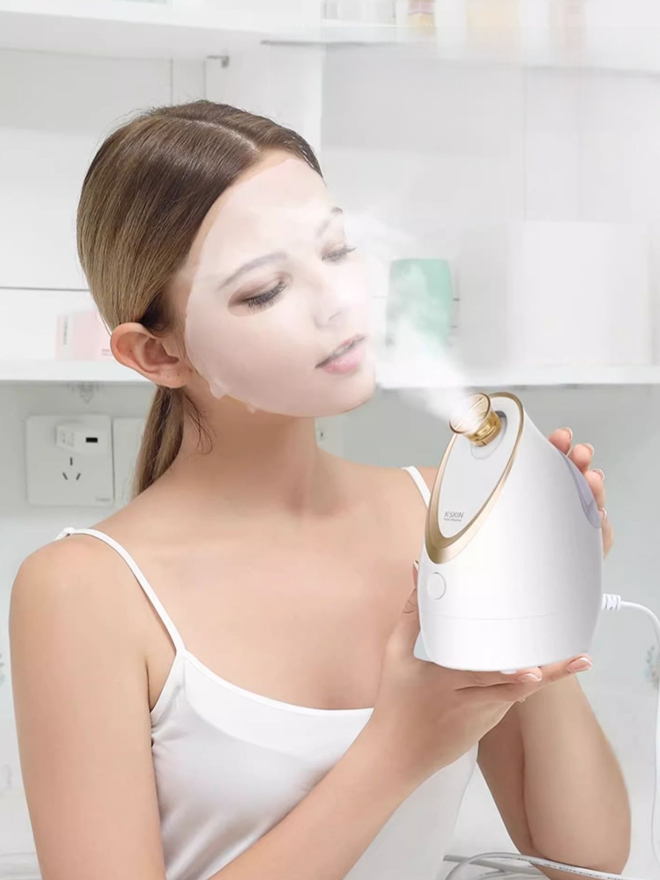 White Trendsi facial steamer with North American plug for deep hydration and skin rejuvenation, shown on a clean surface.