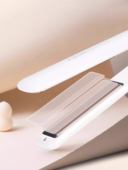 White Trendsi fast heating hair straightener with North American plug, sleek design and ceramic plates for smooth styling.