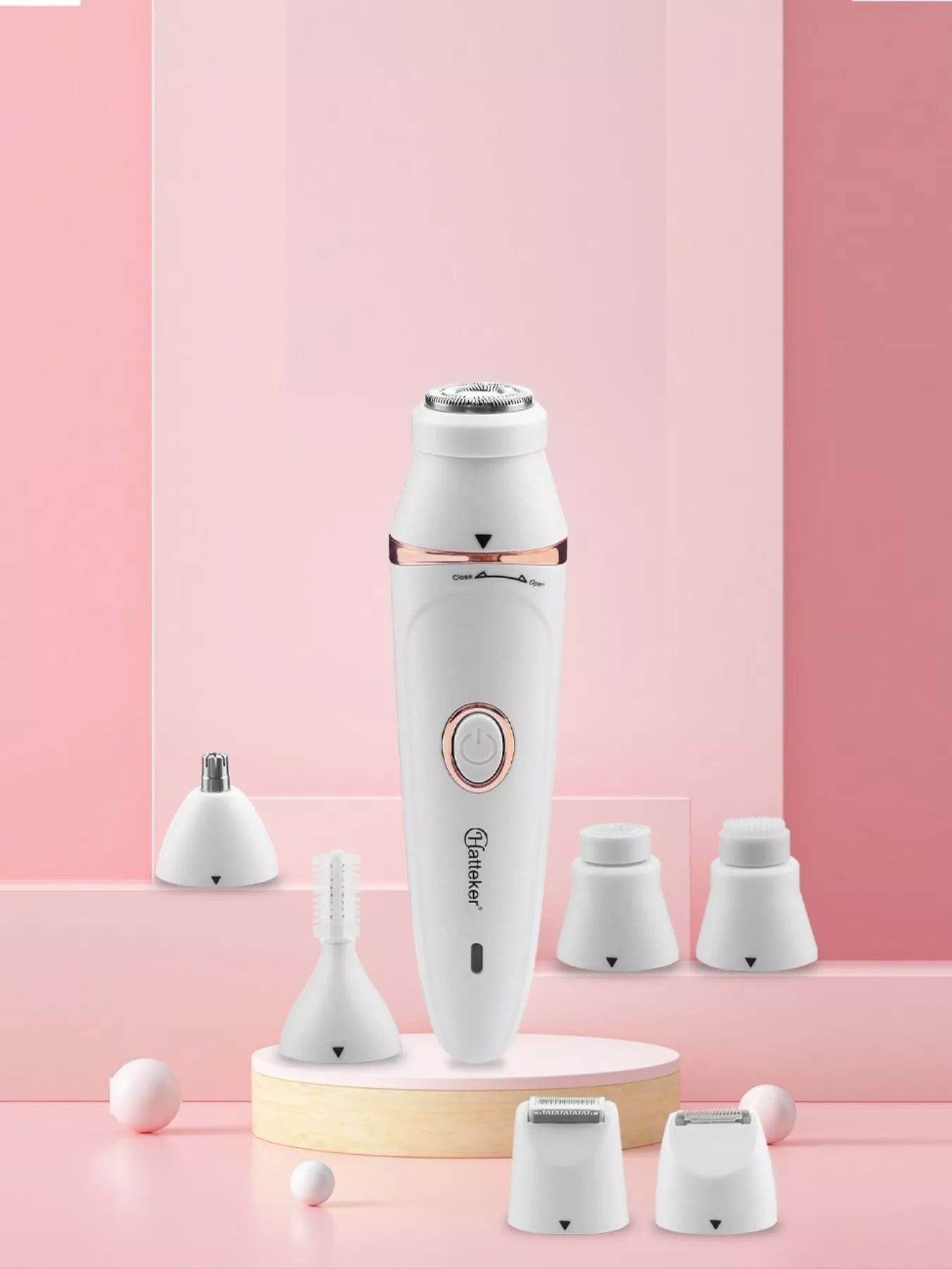 White 7-in-1 multifunctional painless hair removal device by Trendsi, featuring multiple attachments for versatile hair removal.