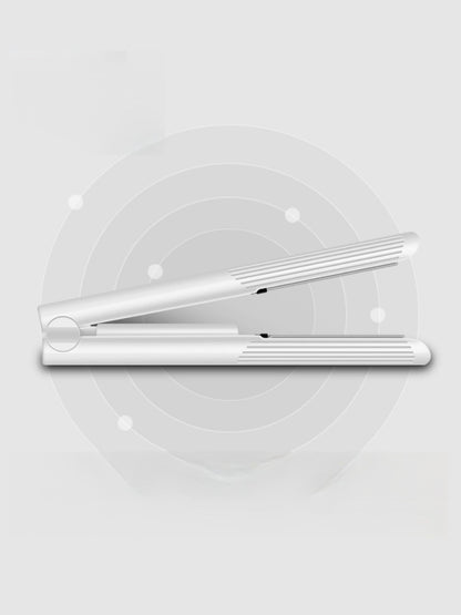 White Trendsi fast heating hair straightener with sleek design and ceramic plates for smooth, shiny hair styling.