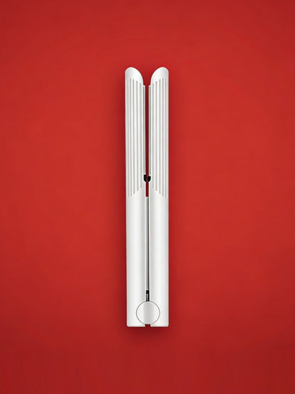 White Trendsi fast heating hair straightener with ceramic plates for sleek, straight hair styling.