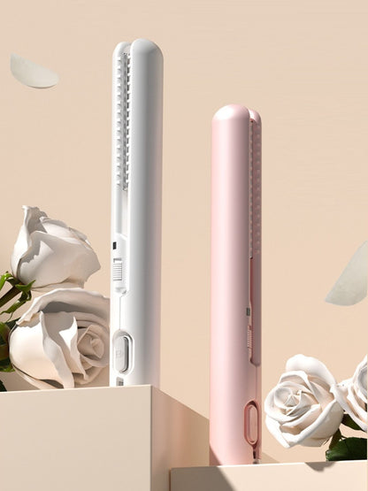 White portable cordless hair straightener from Trendsi, compact design with ceramic plates for quick styling on the go.