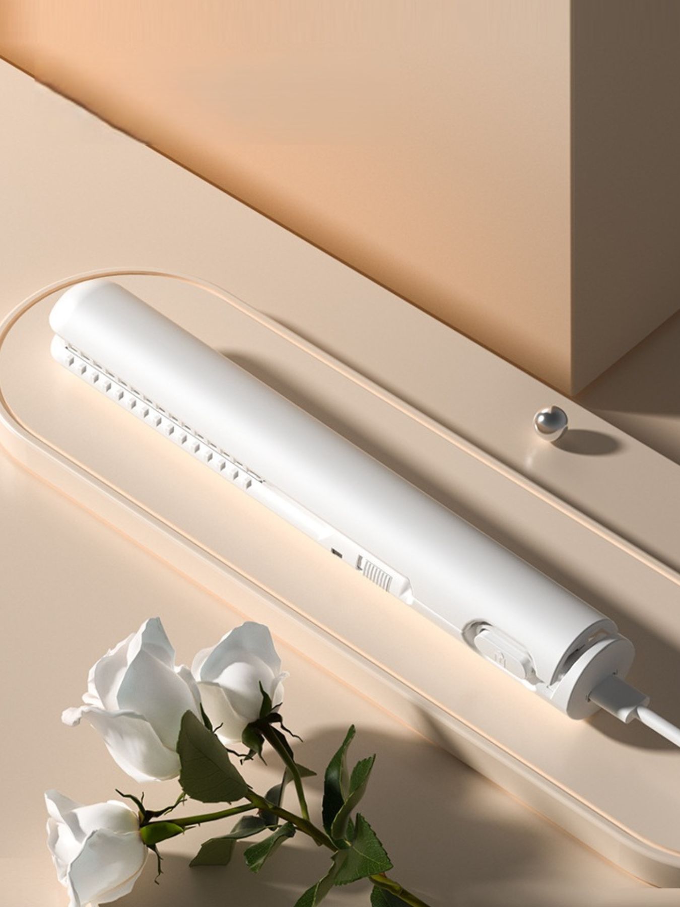 White portable cordless hair straightener by Trendsi, compact design for quick styling on the go.