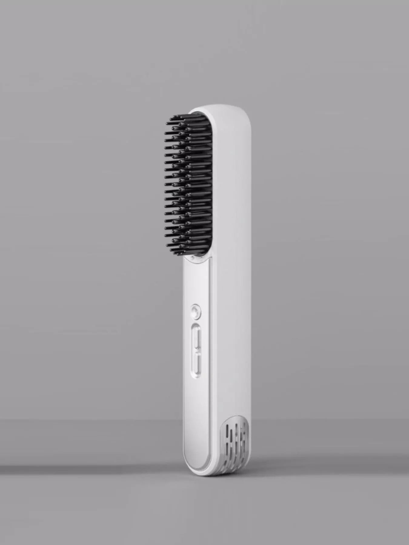 White portable heated straightening comb by Trendsi, compact design for easy styling and hair straightening.
