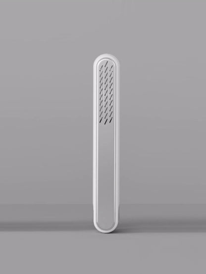 White portable heated straightening comb by Trendsi, featuring a sleek design for easy hair styling on the go.