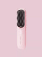 White portable heated straightening comb by Trendsi with ergonomic handle and sleek design for easy hair styling.
