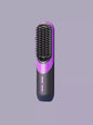 White portable heated straightening comb by Trendsi, compact design for easy hair styling and smoothing.