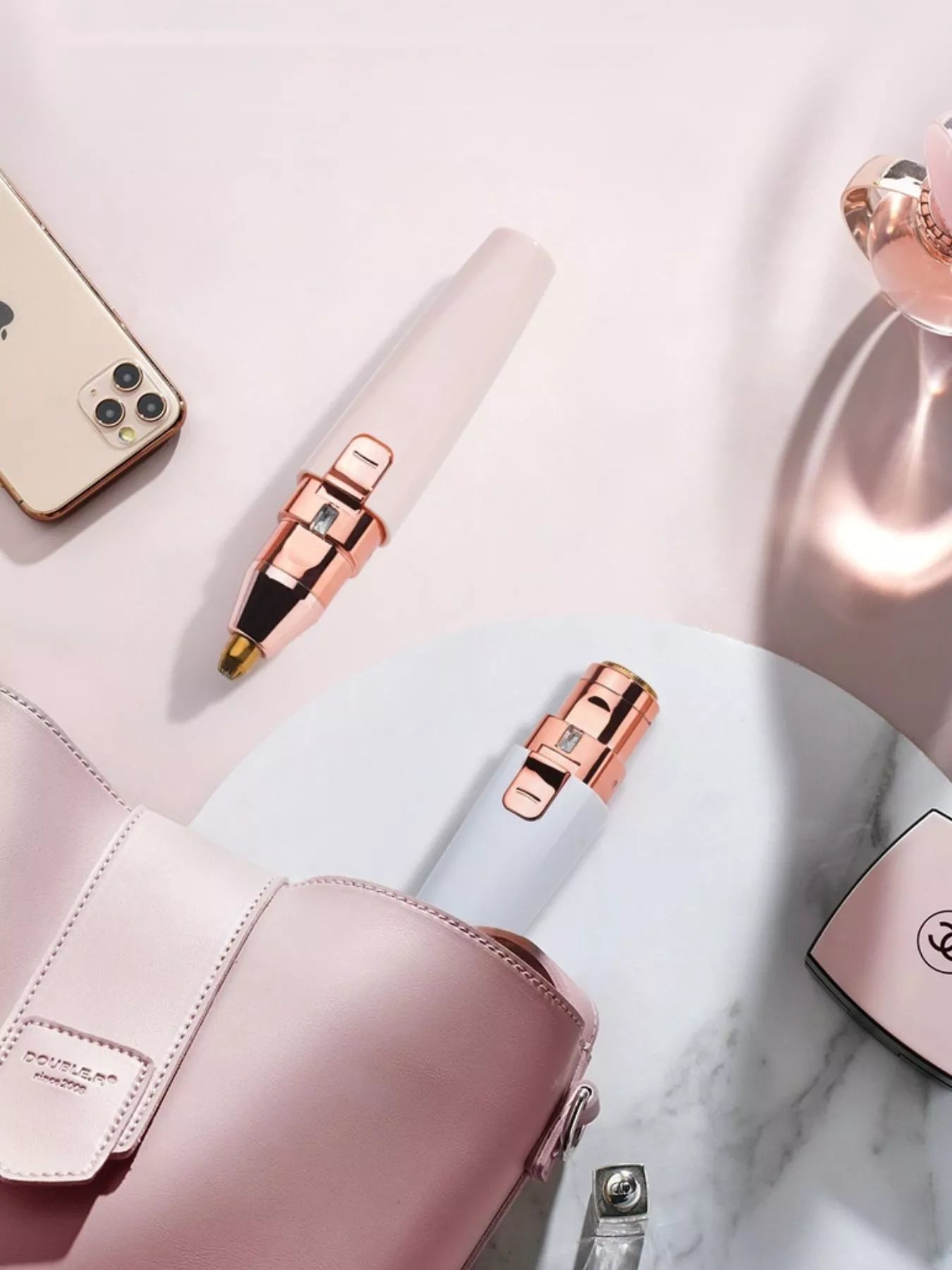 White portable painless hair removal device by Trendsi, compact and easy to use for smooth skin.