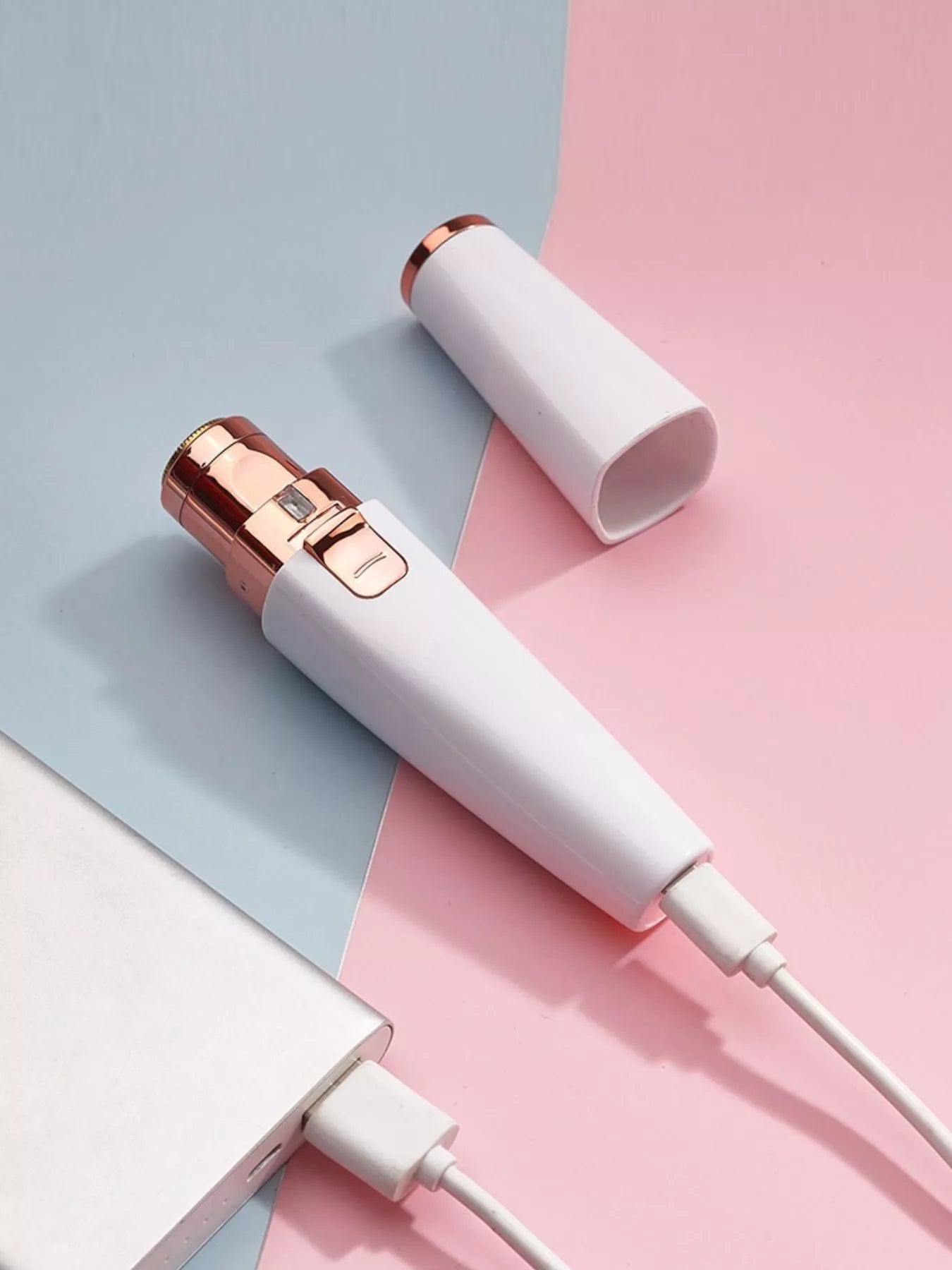 White portable painless hair removal device by Trendsi, compact and easy to use for smooth skin.