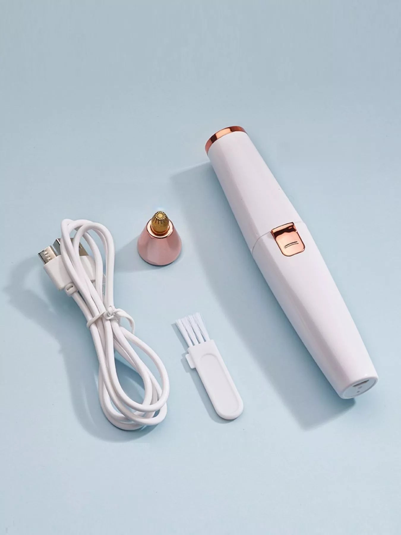 White portable painless hair removal device by Trendsi, compact design suitable for easy at-home use.