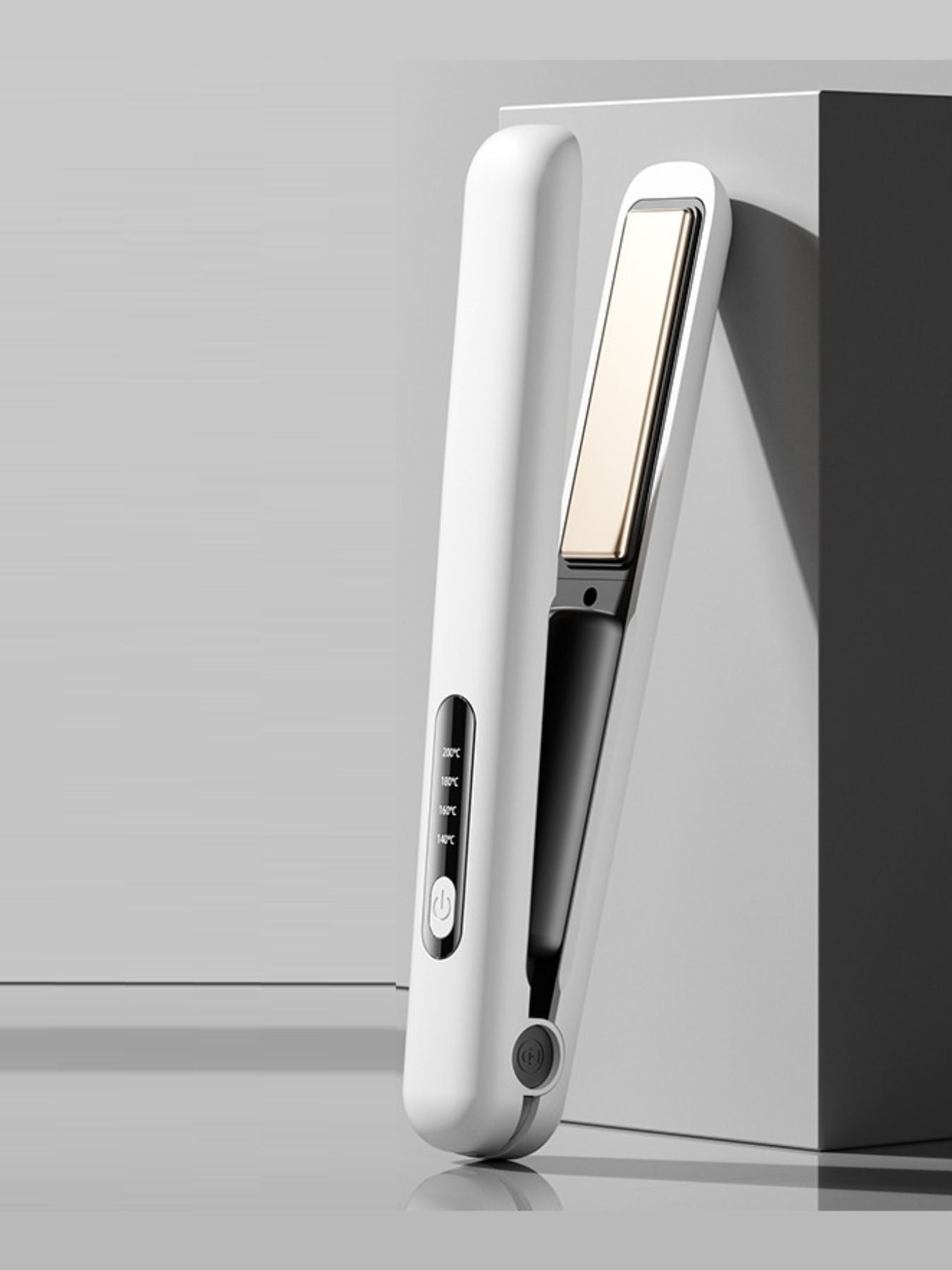 White adjustable temperature hair straightener by Trendsi, featuring a sleek design and ceramic plates for styling.