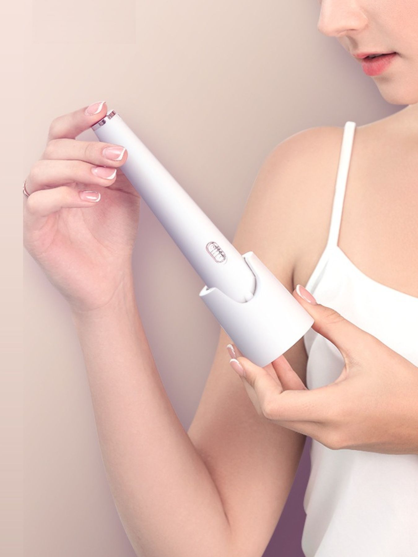White electric nail buffer by Trendsi with multiple polishing surfaces for smooth, shiny nails.