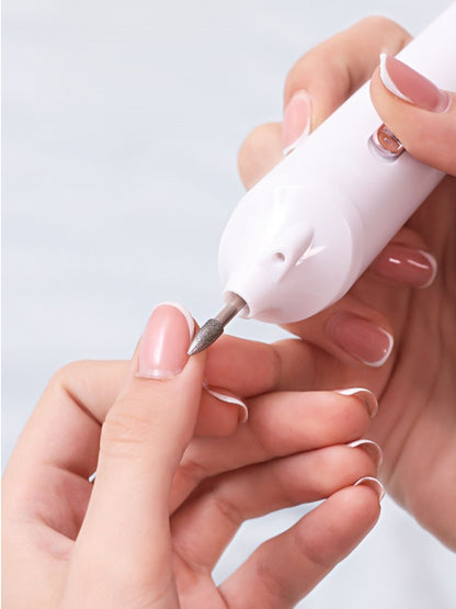 White electric nail buffer by Trendsi with multiple polishing surfaces for smooth, professional-looking nails.