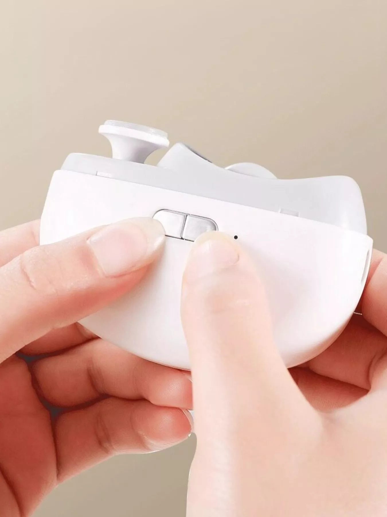 White electric nail buffer from Trendsi with a sleek design, ideal for smoothening and shining nails.