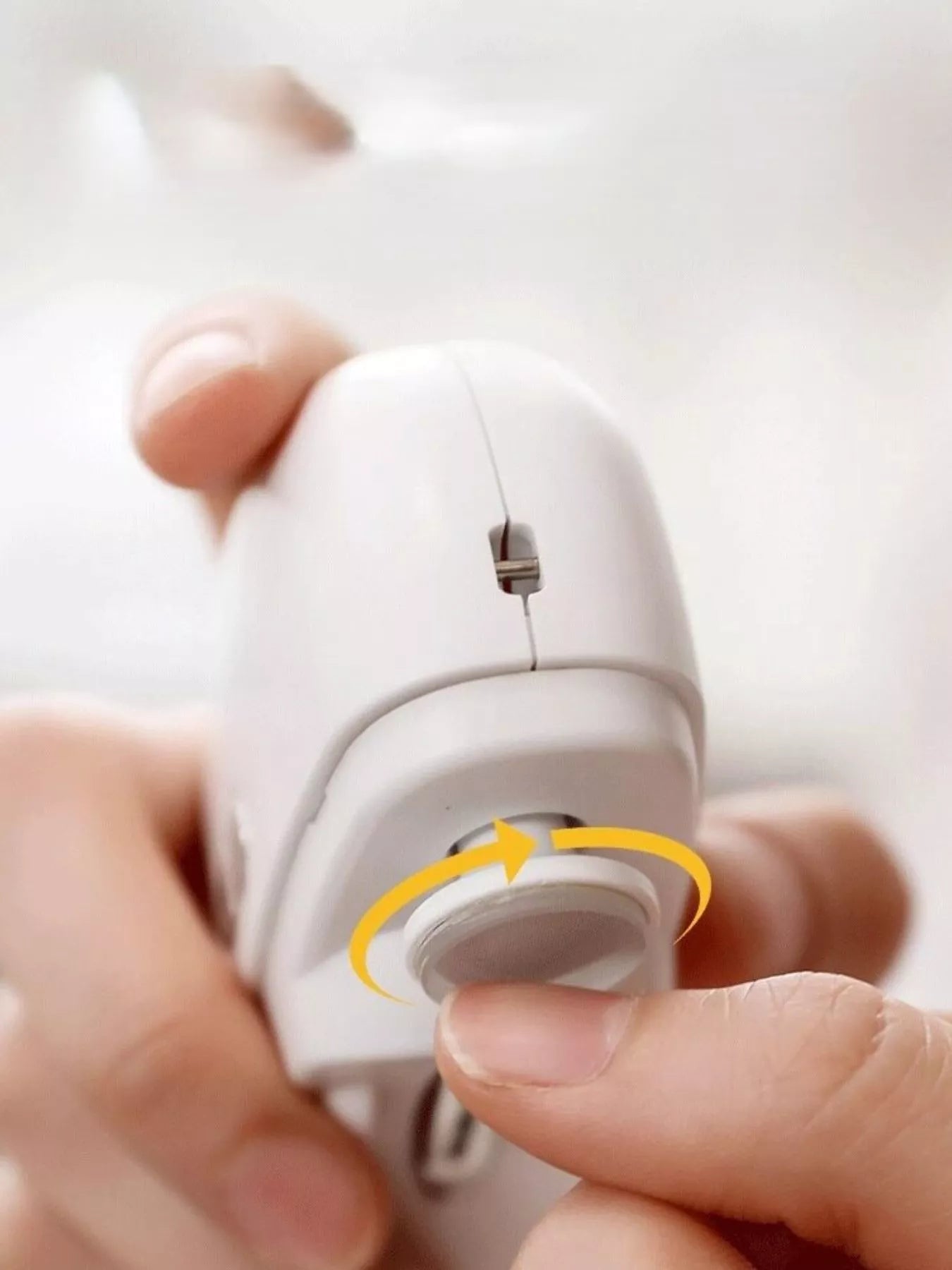 White Trendsi electric nail buffer with ergonomic design for smooth, shiny nails, shown on a white background.
