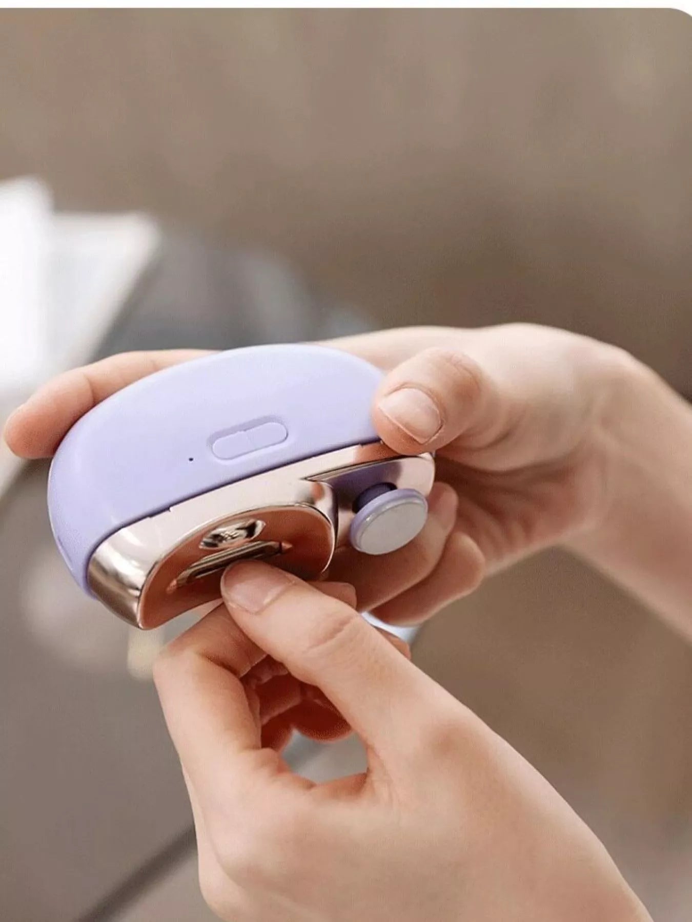 White electric nail buffer by Trendsi with multiple polishing surfaces for smooth, shiny nails.