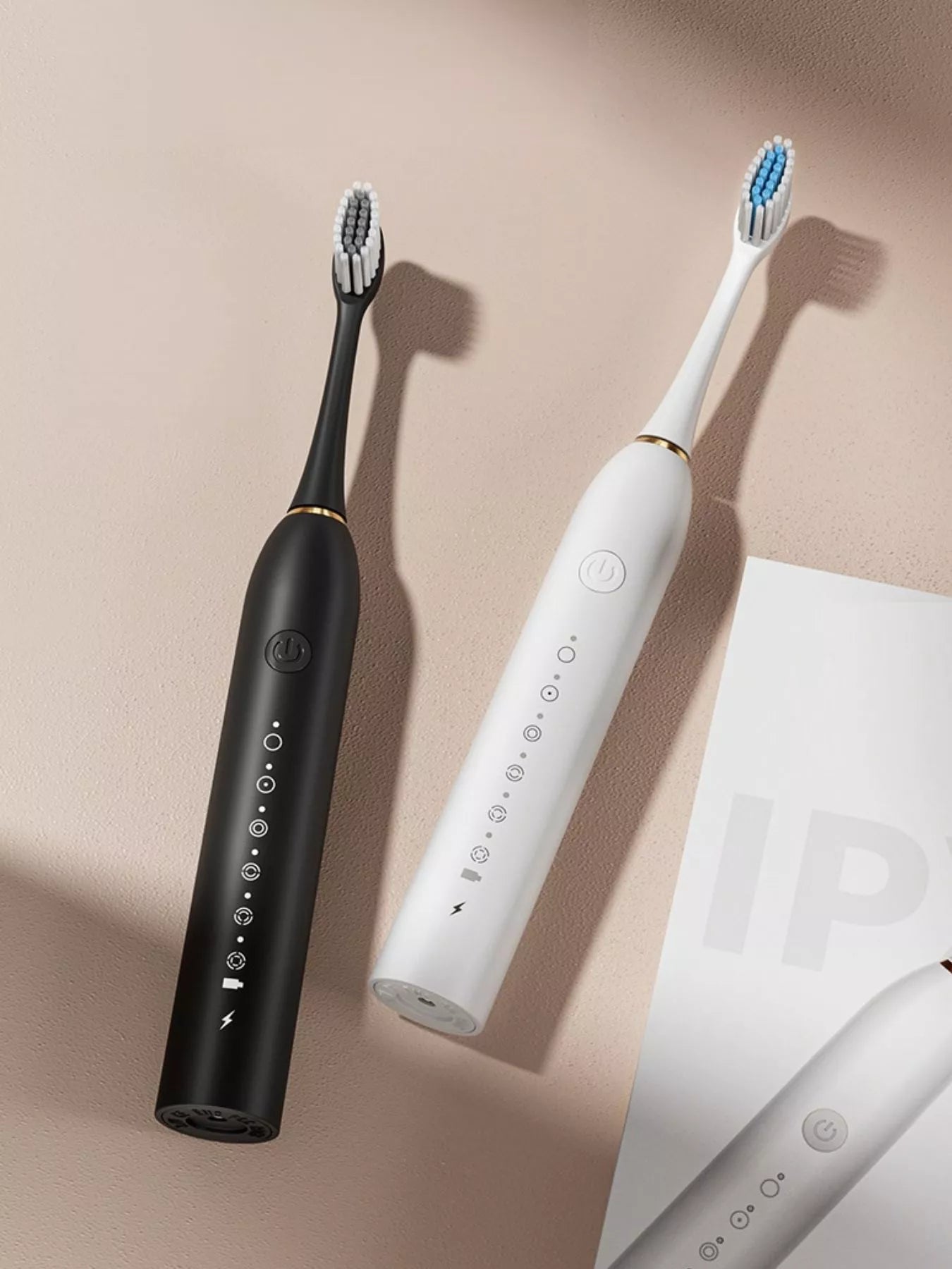 White electric toothbrush with multiple brushing modes from Trendsi, featuring a sleek design and ergonomic handle.