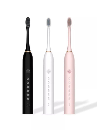White Trendsi electric toothbrush with multiple cleaning modes and ergonomic handle, ideal for a thorough oral hygiene routine.