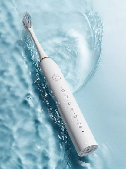 White electric toothbrush with multiple cleaning modes from Trendsi, featuring a sleek design and interchangeable brush heads.